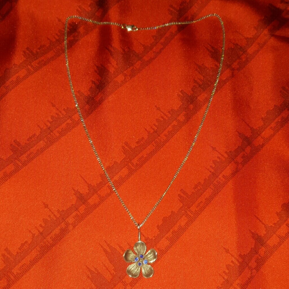 Handmade silver and sapphire dogwood flower neckla
